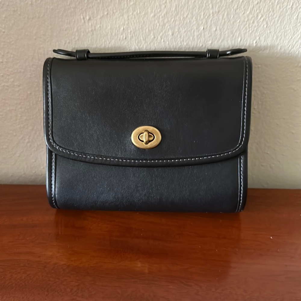 From the Coach Originals Collection, Kip Turnlock Crossbody